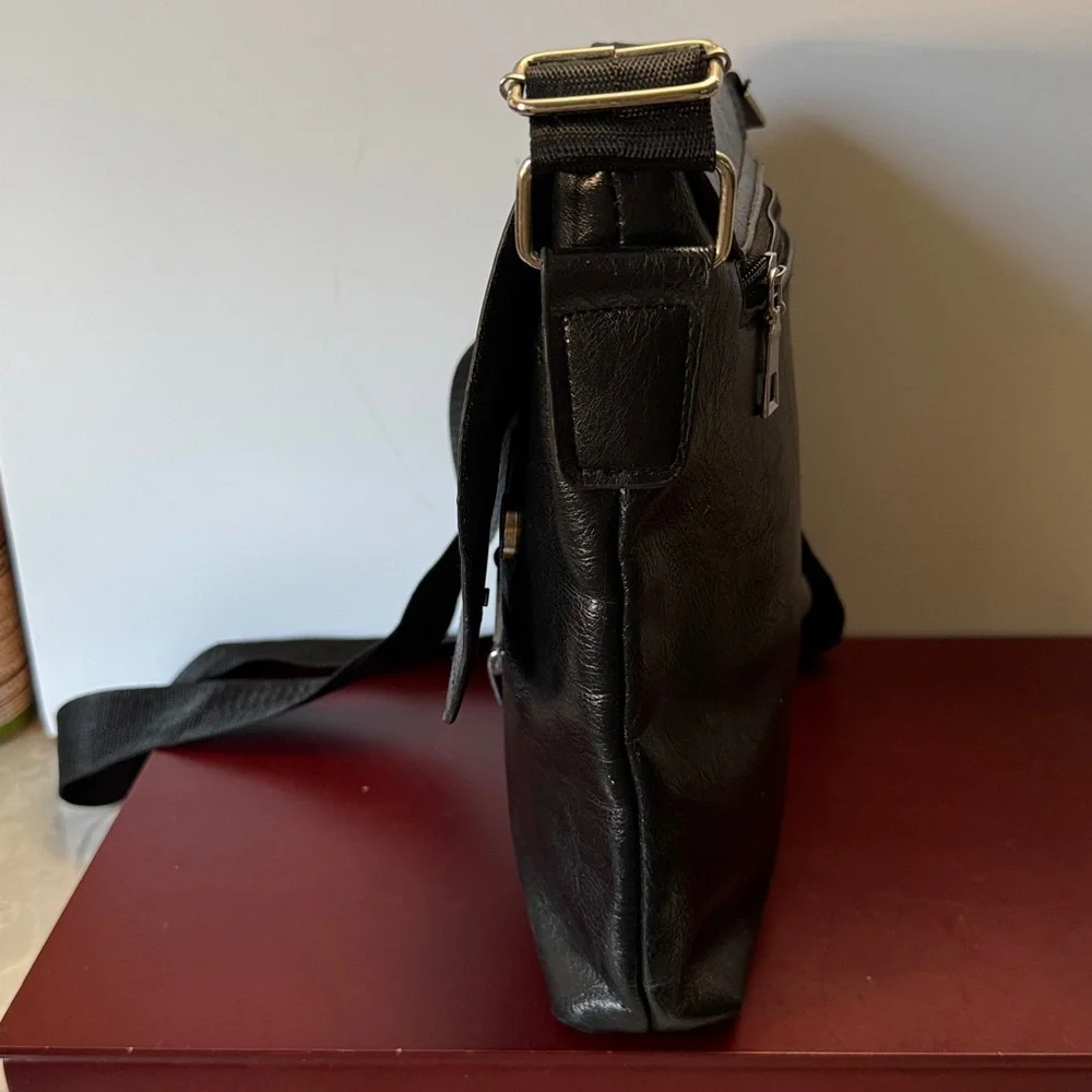 Delika-stylish black Crossbody messenger /handbag great for both men or women
